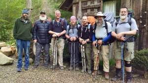 The AARP gang with our host Lumpy on the left at Standing Bear
