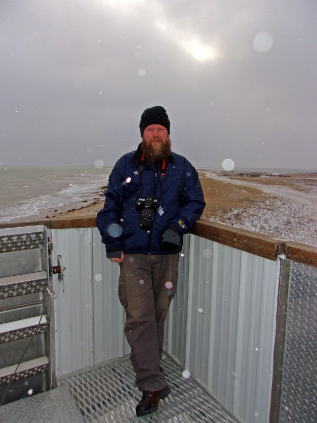 Rev Kane relaxing in the snow flurries
